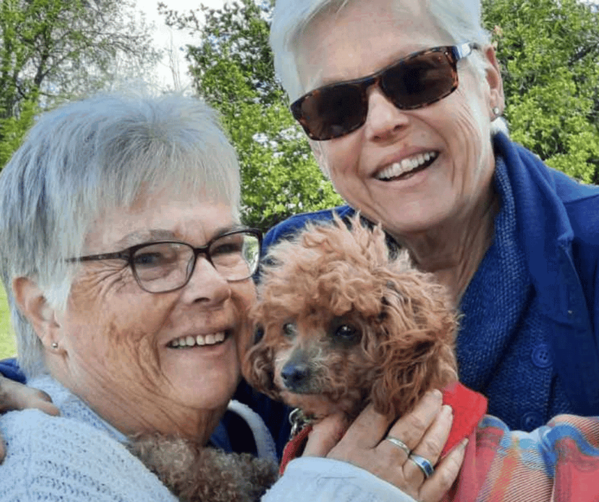 Donna with her sister Judy and dog Yazi
